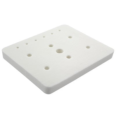 Angled view of the JEM Roller Pad showing a white foam surface with various sized holes for cutter placement.