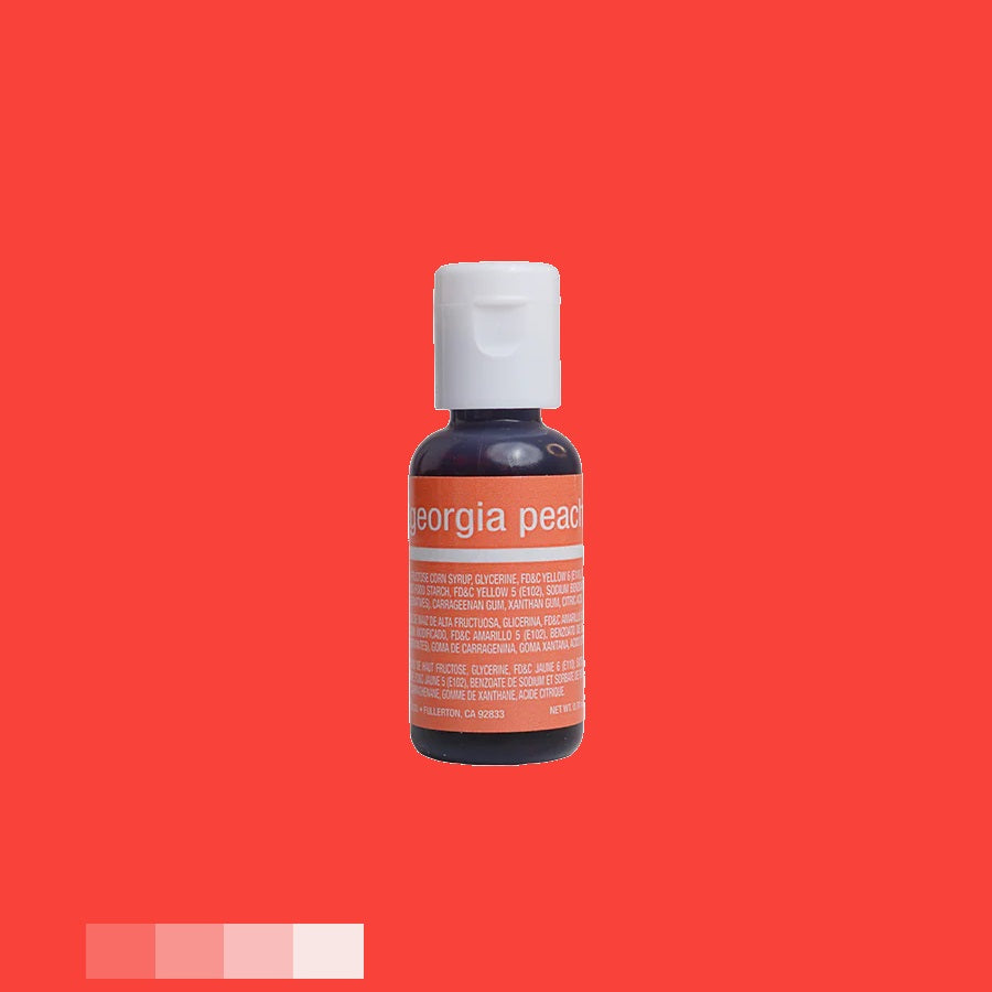 This shows a chefmaster food coloring bottle with a peach-colored gel. The label says "georgia peach" in white letters over a red banner. The rest of the label provides product information in white font against a darker backdrop, complementing the gel's hue.