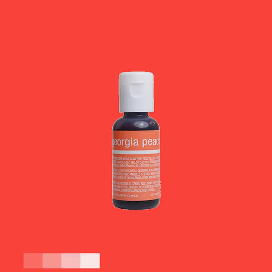 This shows a chefmaster food coloring bottle with a peach-colored gel. The label says "georgia peach" in white letters over a red banner. The rest of the label provides product information in white font against a darker backdrop, complementing the gel's hue.
