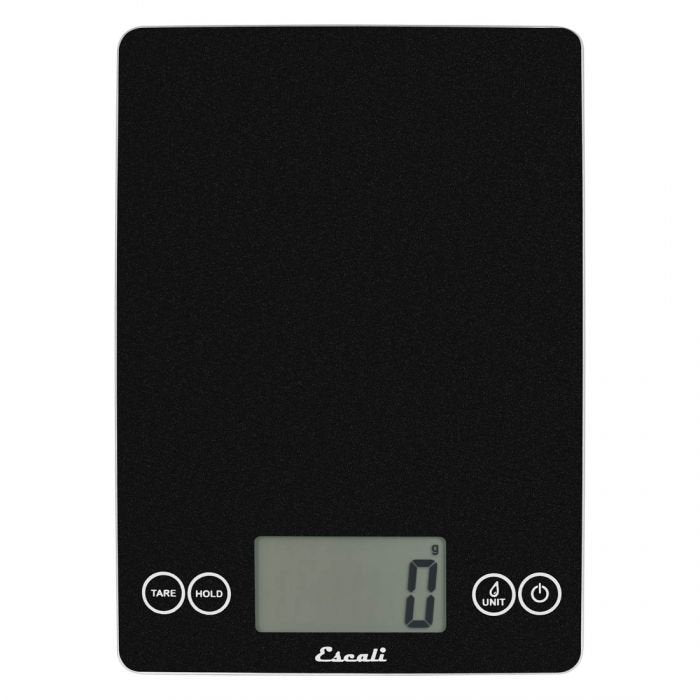 A sleek black digital kitchen scale with a smooth glass surface, large digital display, and touch-sensitive controls for tare, hold, unit selection, and power.