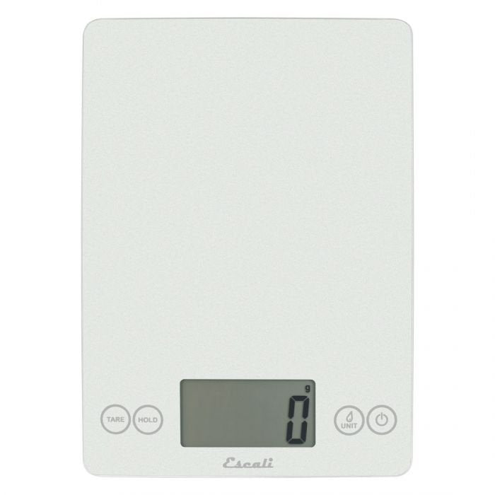 A sleek white digital kitchen scale with a smooth glass surface, large digital display, and touch-sensitive controls for tare, hold, unit selection, and power.