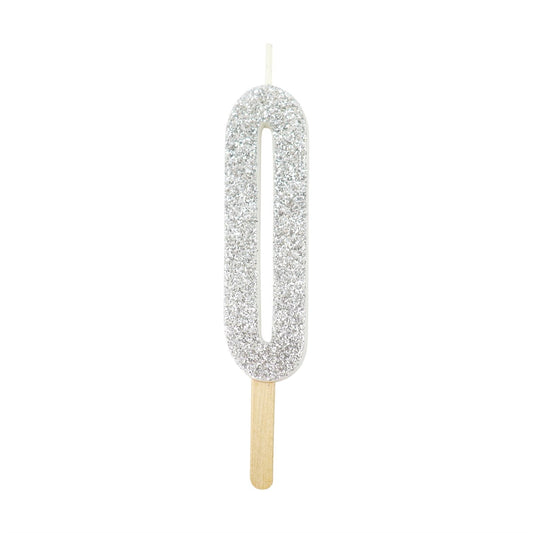 Silver glitter number 0 candle with attached pick, ideal for cakes and celebration decor.