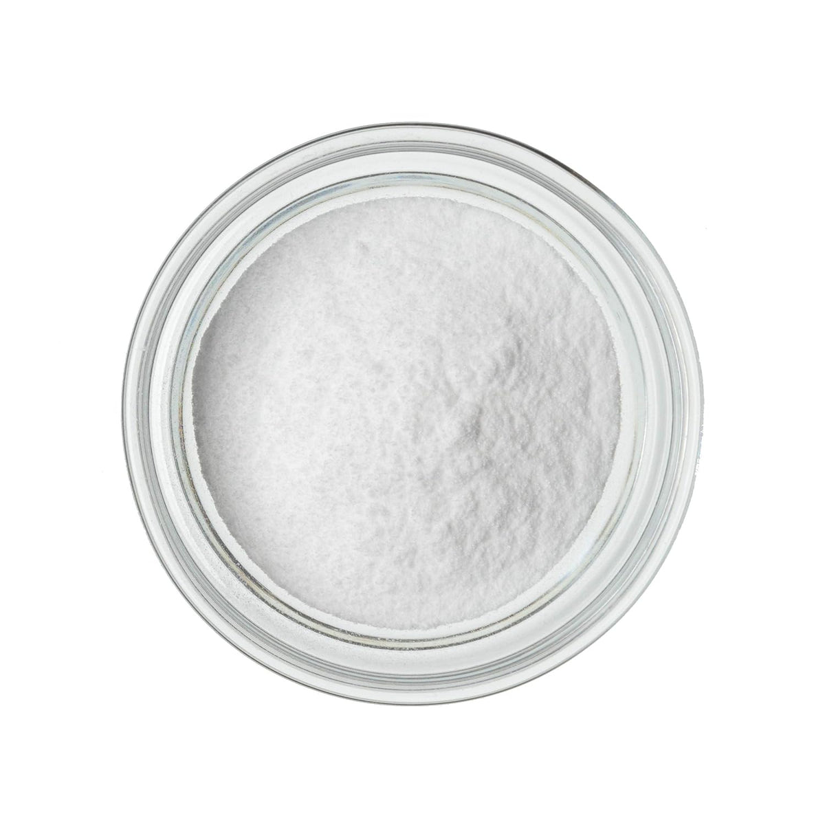 White glucose powder in a round, clear glass bowl, viewed from above on a white background.