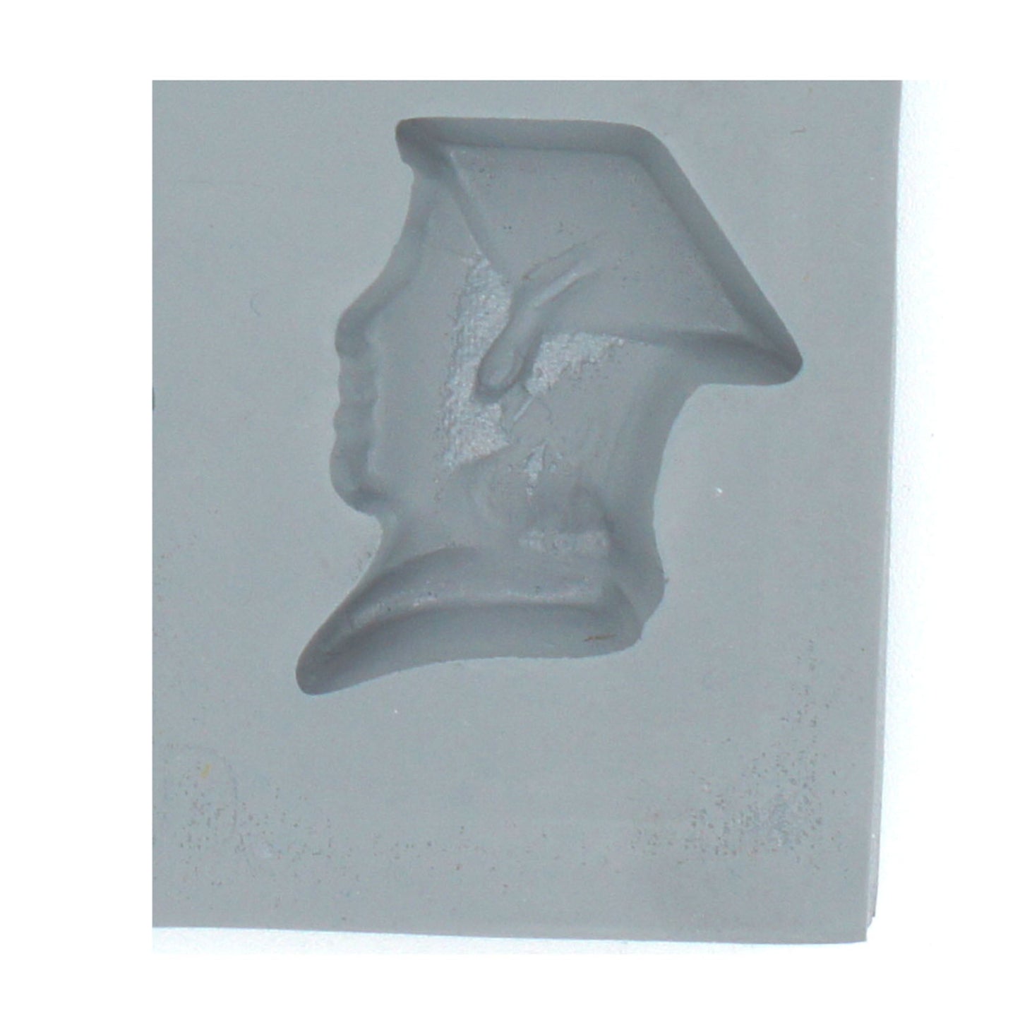 Close-up of a single student silhouette mint mold cavity showing a graduate profile, ideal for cream cheese mints or chocolates.