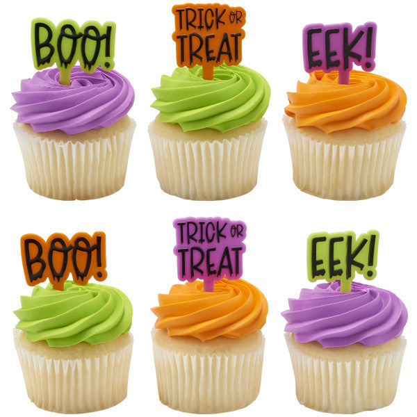 Halloween-themed cupcake picks displayed on cupcakes with colorful frosting, perfect for parties and festive treats.