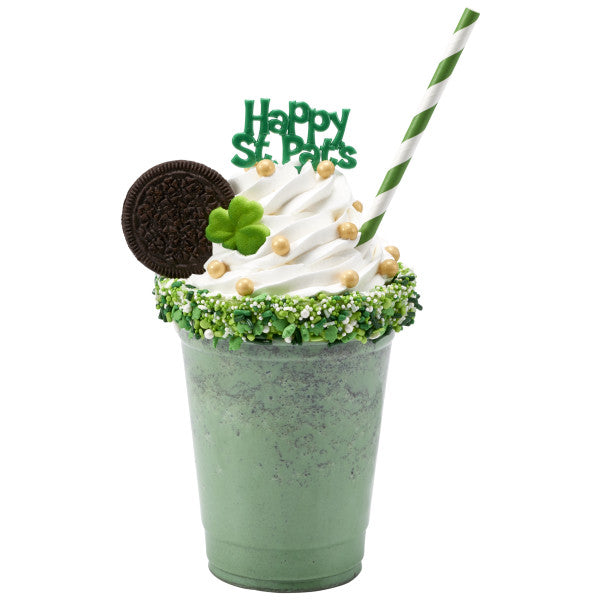 Green mint milkshake topped with whipped cream, Oreo cookie, sprinkles, and a “Happy St. Pat’s” pick