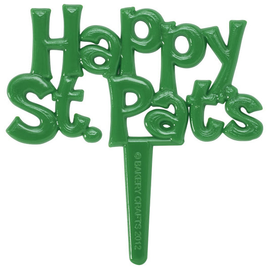 Close-up of the green plastic “Happy St. Pat’s” pick, text-style topper with a pointed stake