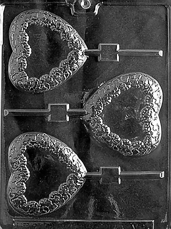 Chocolate mold featuring three large heart-shaped lollipops, each with a decorative floral border and lollipop stick slot.