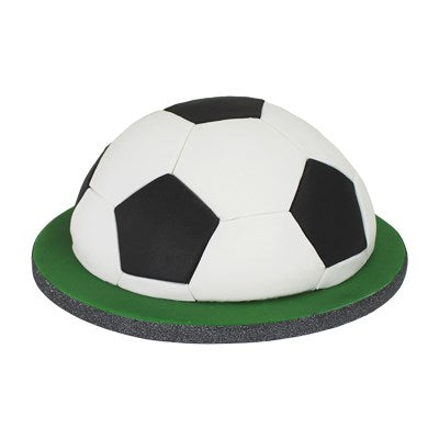 Finished football-themed cake made using PME ball pan, decorated with black and white fondant