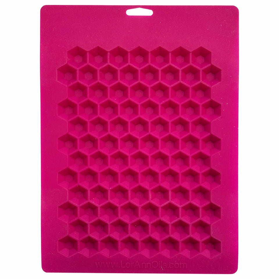 Reverse view of the same pink silicone mold showing depth and detailing of the 90 geometric cube cavities.