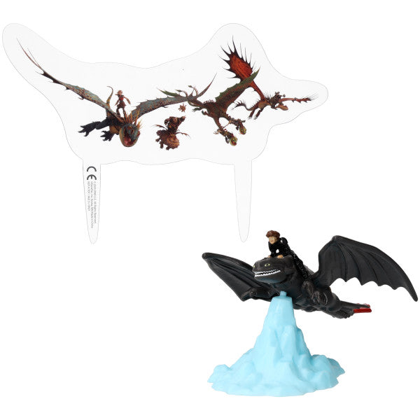 How to Train Your Dragon cake topper set with pivoting Toothless figurine on blue mountain base and background pick featuring flying dragons.