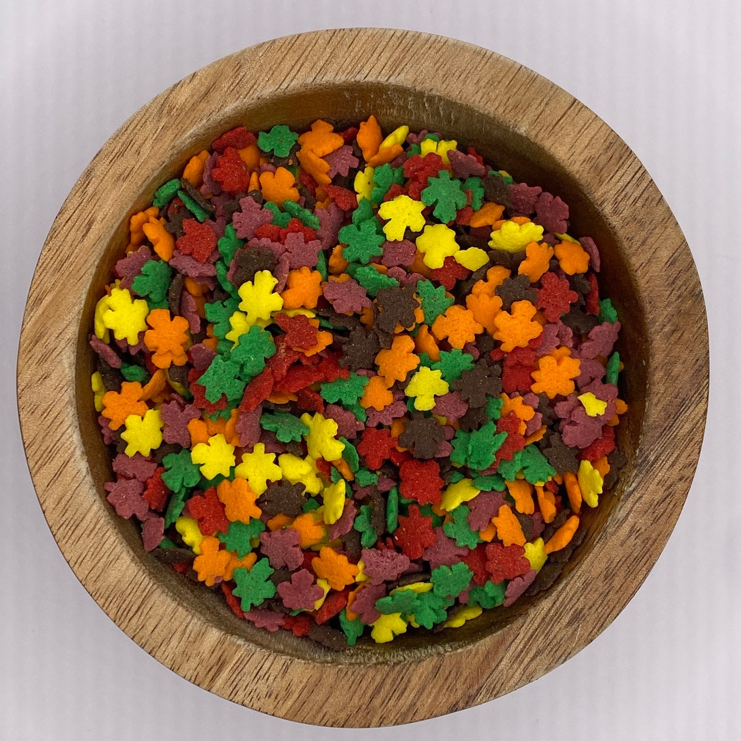 leaf shaped sprinkles in a bowl