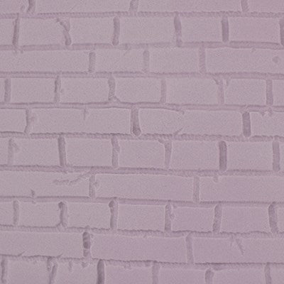 Close-up of embossed brick pattern created with PME Brick Impression Mat on fondant.