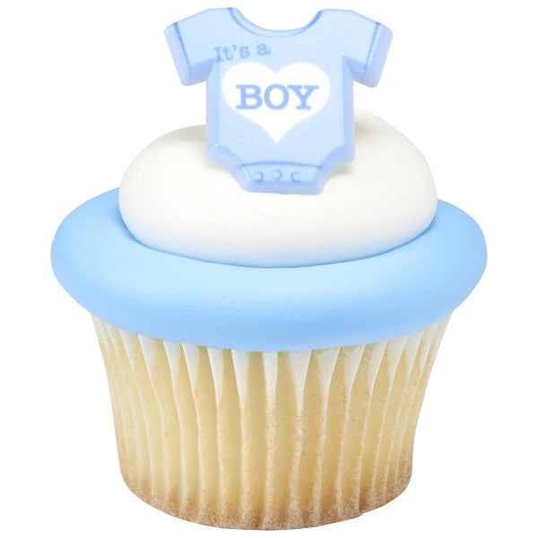 Vanilla cupcake topped with a swirl of white frosting and an "It's a Boy" cupcake ring
