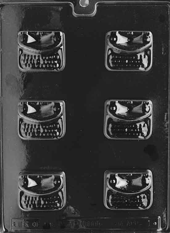 Image shows TYPEWRITER mold with detailed, retro typewriter shape in a compact layout.