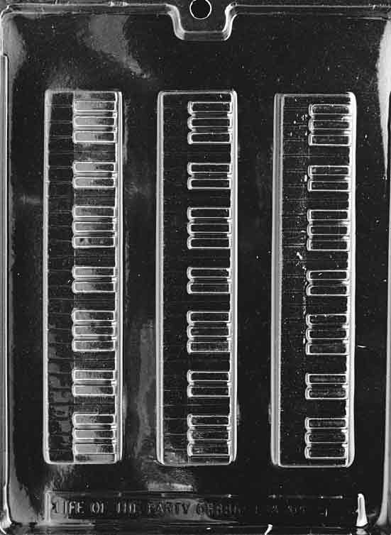 Image shows PIANO KEYBOARD mold with long, narrow cavity featuring piano keys in raised detail.