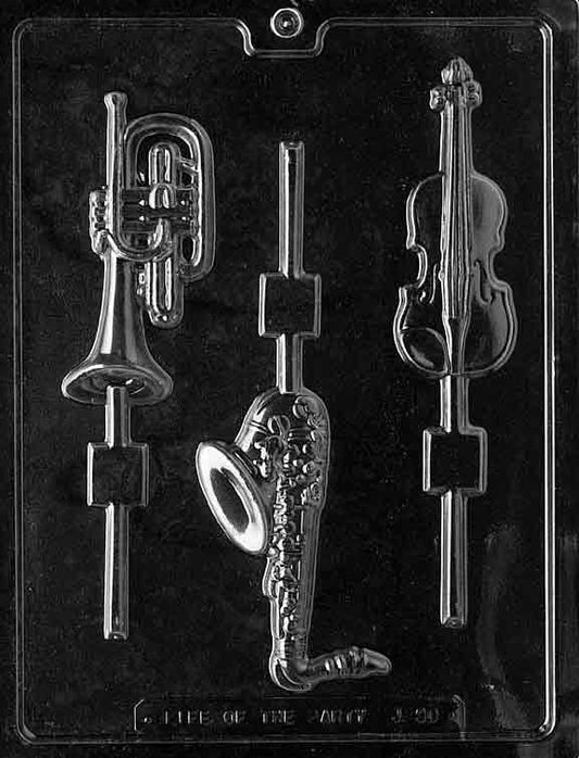 Image of MUSICAL INSTRUMENTS Lollipop mold with detailed chocolate shapes of instruments on sticks.