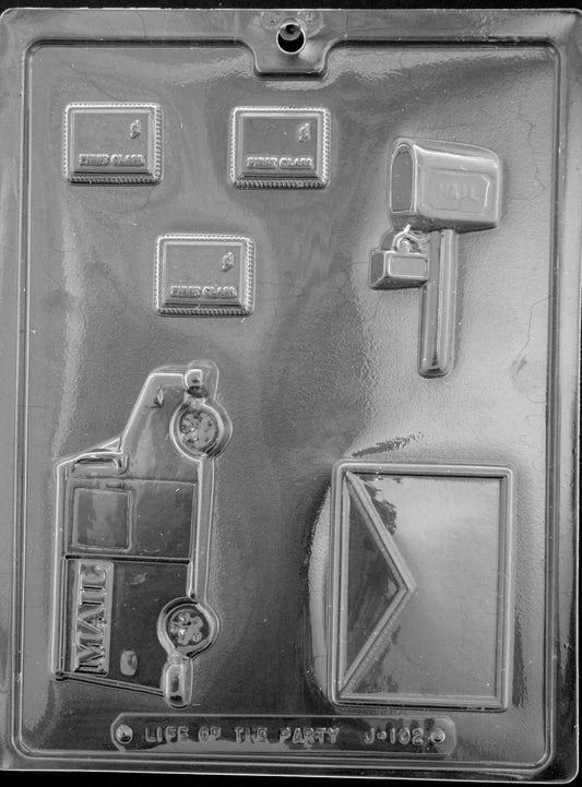Image of MAIL KIT chocolate mold featuring truck, mailbox, envelope, and stamp-shaped cavities.