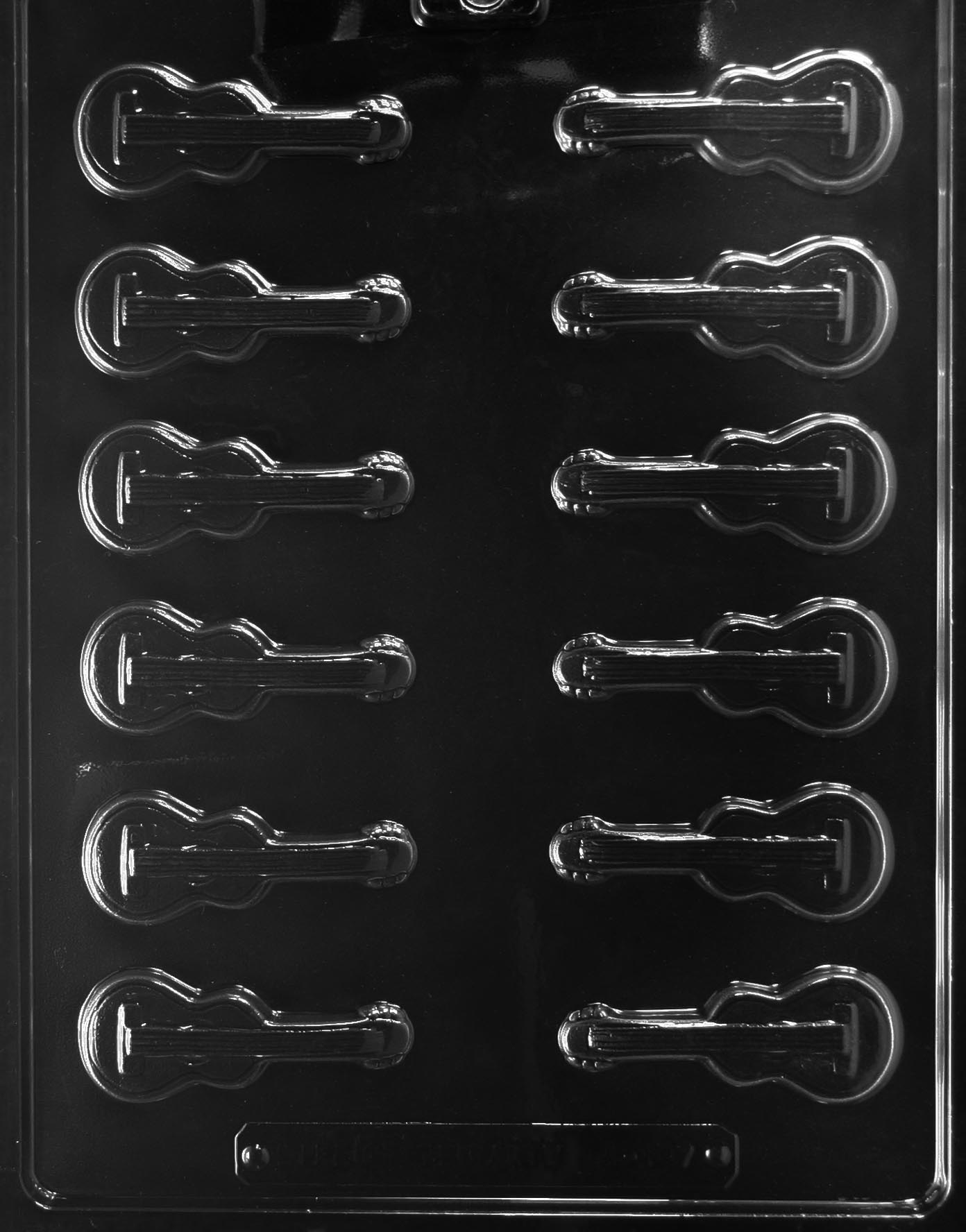 Image of GUITAR PIECE mold with miniature chocolate guitar shape featuring body curves and frets.