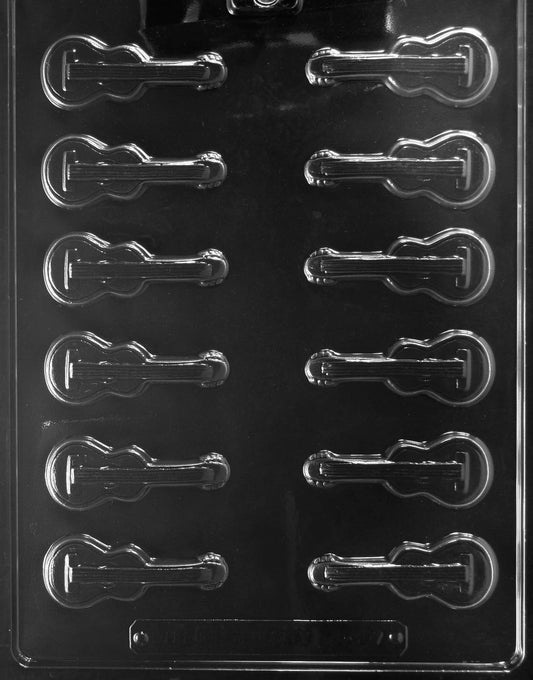 Image of GUITAR PIECE mold with miniature chocolate guitar shape featuring body curves and frets.