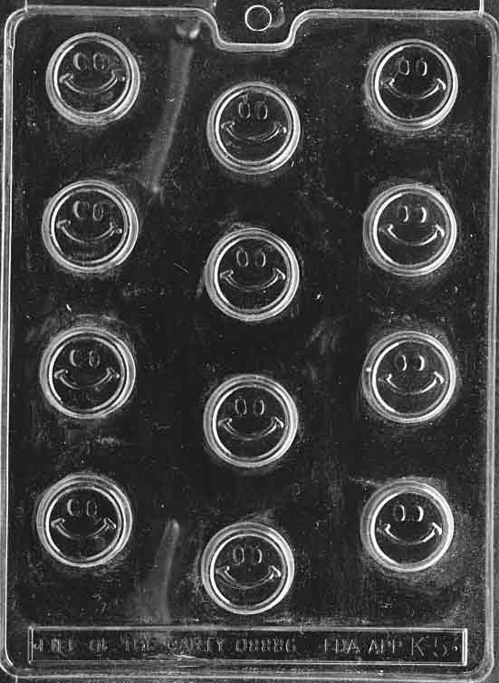 Image of BITE SIZE SMILE mold showing small circular chocolates with embossed smiling faces.