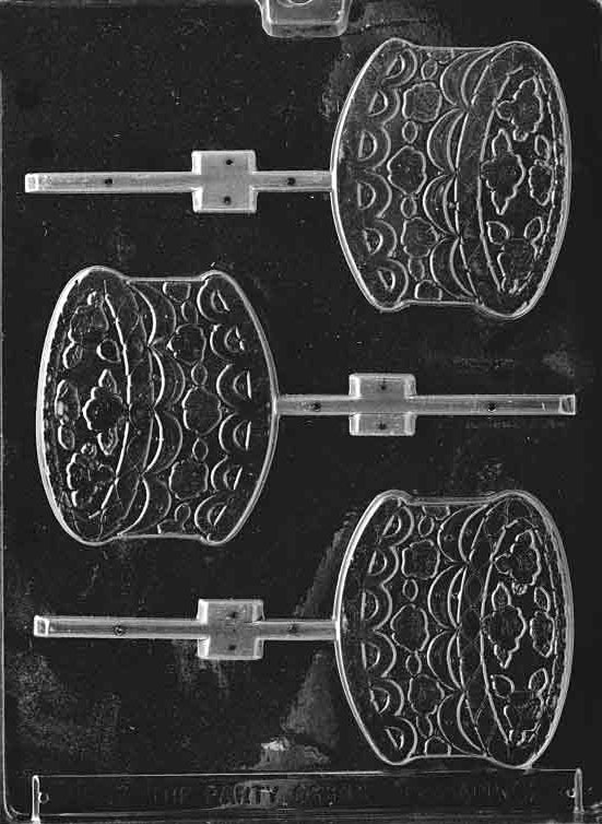 Image of CAKE Lollipop mold featuring triangle-shaped cake slice in chocolate with candle design.
