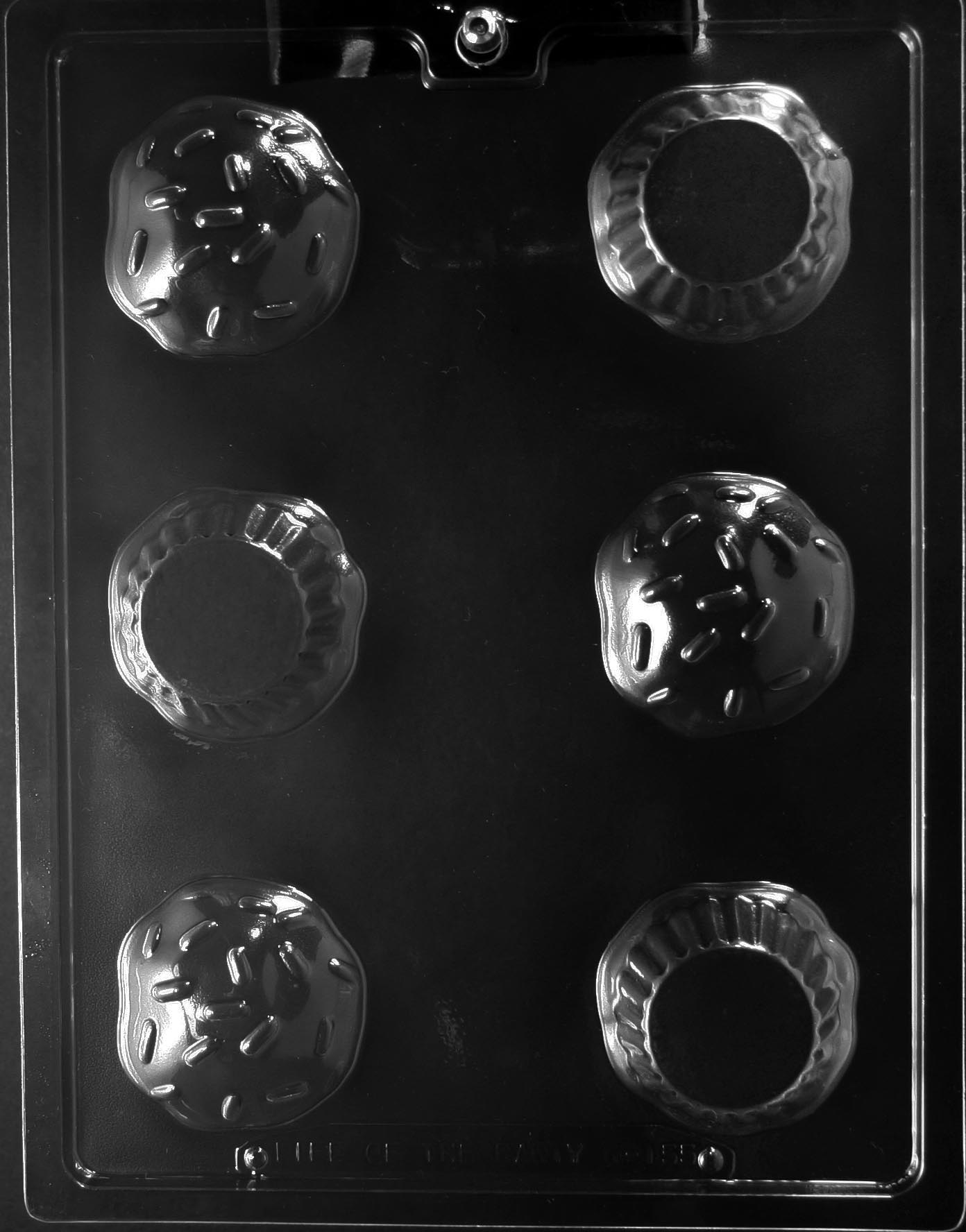 3D Cupcakes chocolate mold, clear mold forming cupcake shapes with frosting-style tops.