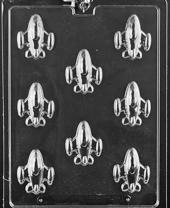 Spaceship chocolate mold, clear mold with rocket-style design for candy making.