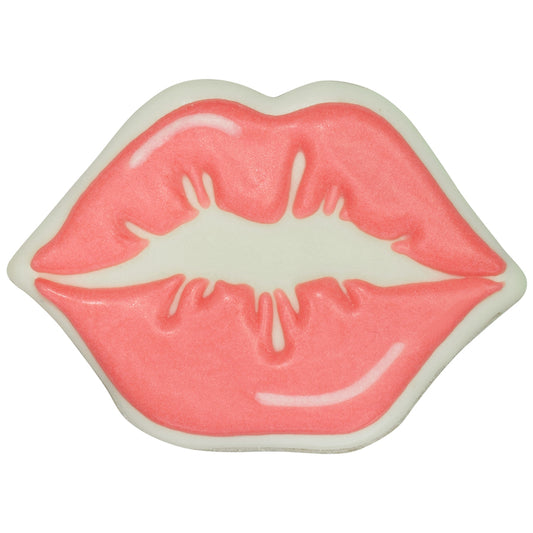 Decorated kissing lips cookie with soft pink icing, white outline, and curved white highlight accents on a white background.