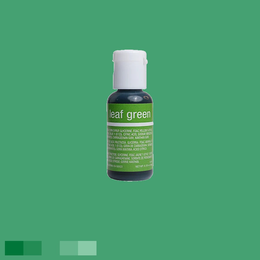 The bottle contains a rich green liquid, with "leaf green" written in white on the label. A white cap sits on top, and the label provides detailed product information in white lettering.