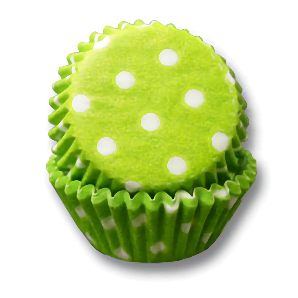 Lime green mini cupcake liner with white dots, stacked view