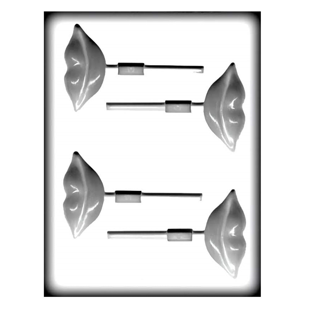 A Lip Shaped Hard candy sucker mold. The mold has four lip shaped cavities with a slot in each for a sucker stick