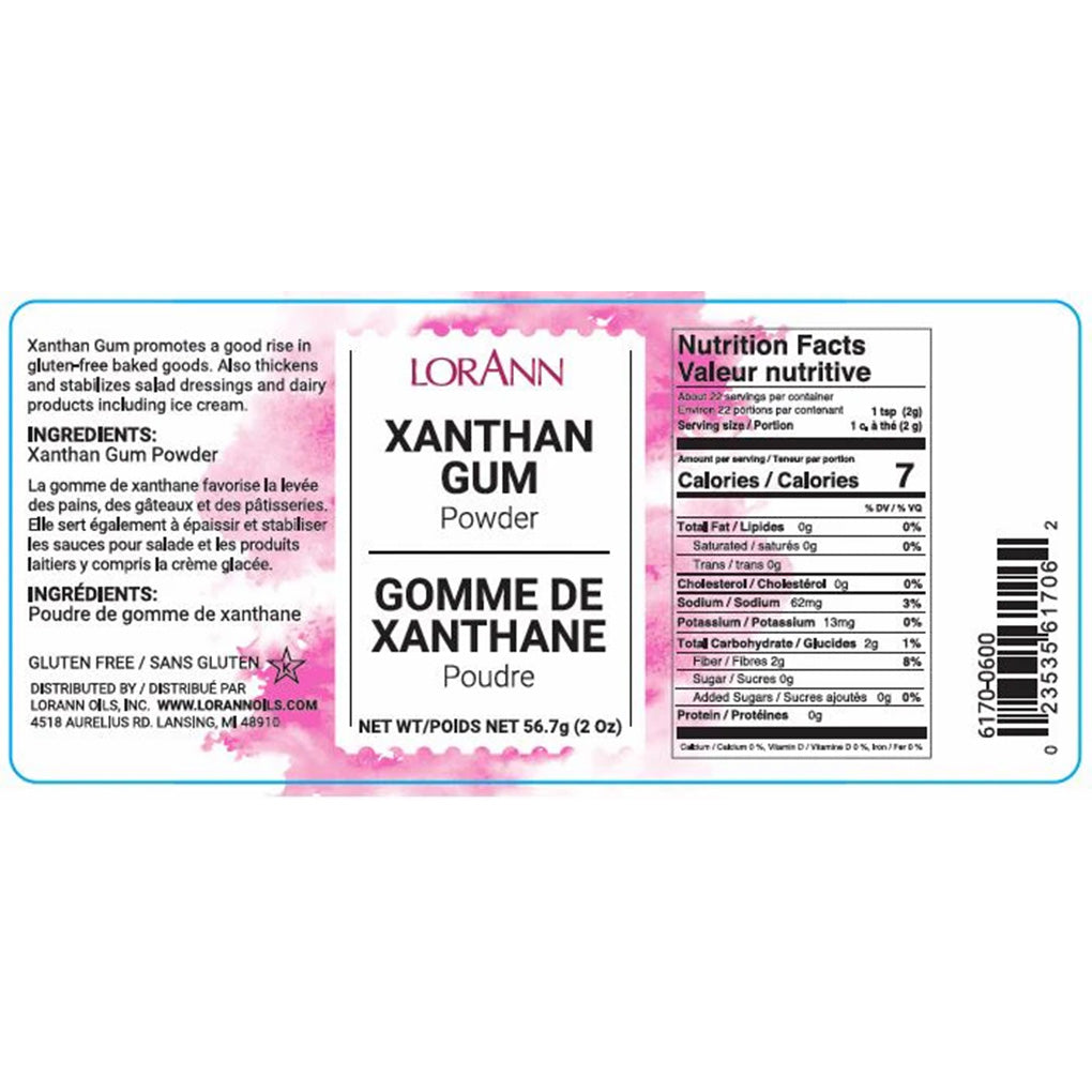 LorAnn Xanthan Gum label close-up with pink watercolor-style background, ingredient and nutrition panel, and text describing use for gluten-free baking and thickening sauces.