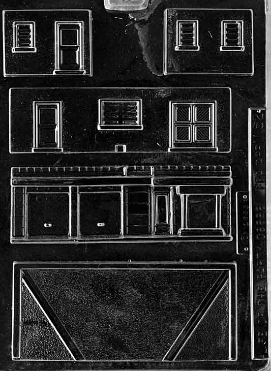 Chocolate mold M052 Garage with panel pieces shaped to assemble chocolate garages.