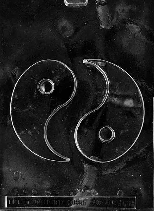 Chocolate mold M138 Yin-Yang with circular design featuring contrasting halves for chocolate projects.