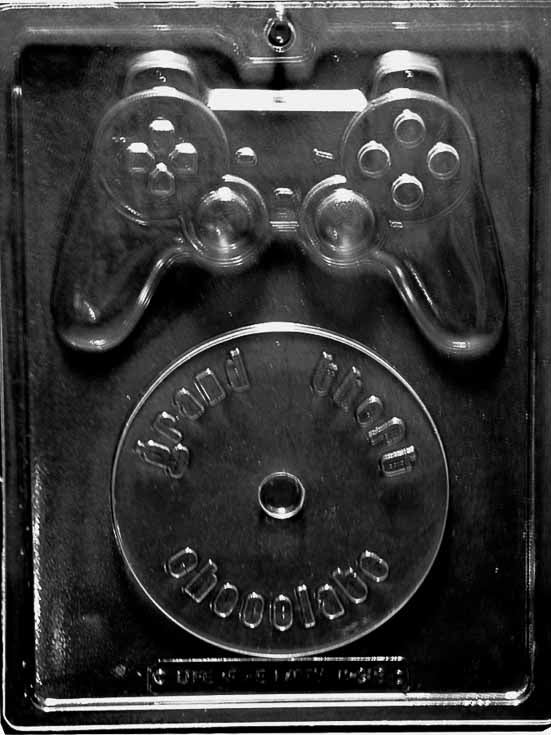 Chocolate mold M216 Video Game Kit with controller and disc-shaped cavities for chocolates.