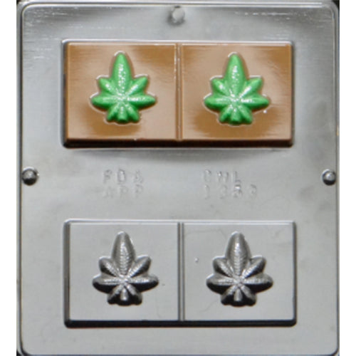 A rectangular chocolate mold with two cavities, each featuring a raised marijuana leaf design, for creating large chocolate bars.