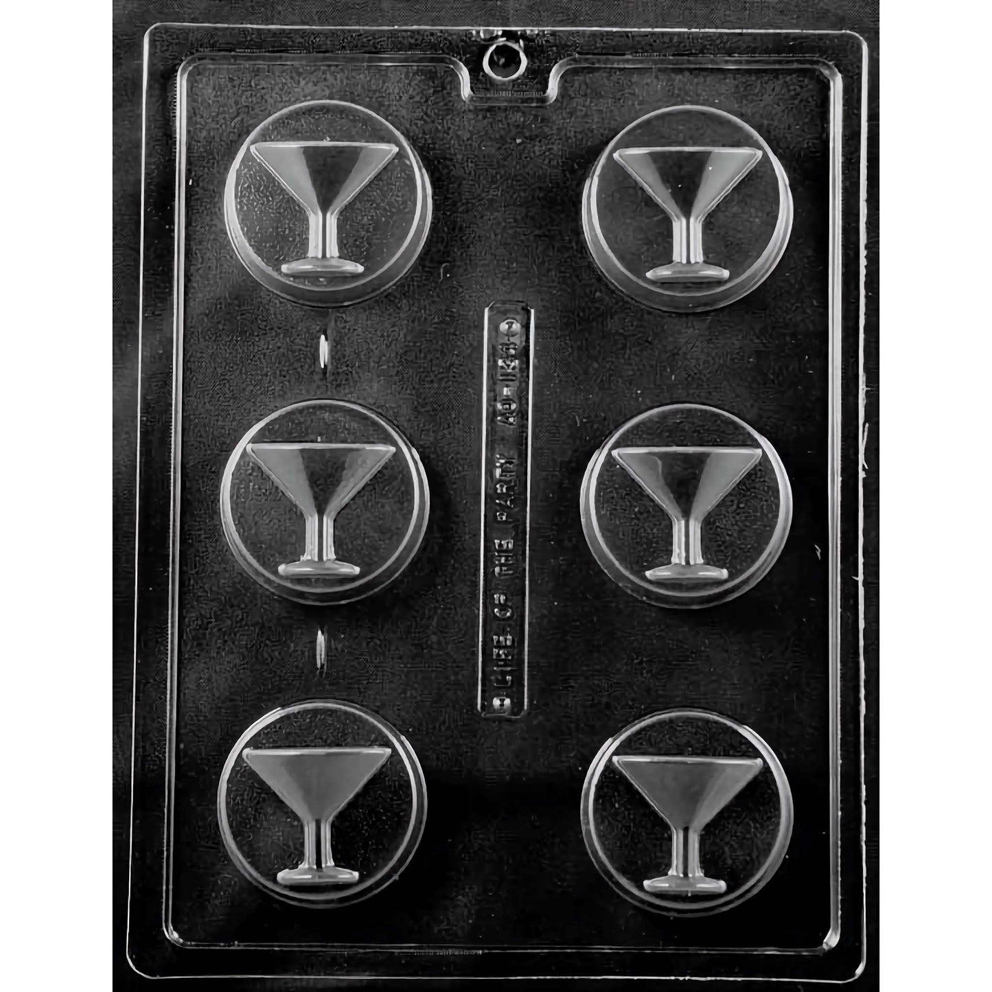 Clear plastic chocolate mold designed for creating martini glass-shaped cookies or chocolates, featuring six compartments, each shaped like a classic martini glass with a detailed stem and base. The mold is set against a black background, highlighting the sleek design of each glass compartment.