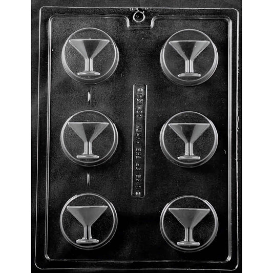 Clear plastic chocolate mold designed for creating martini glass-shaped cookies or chocolates, featuring six compartments, each shaped like a classic martini glass with a detailed stem and base. The mold is set against a black background, highlighting the sleek design of each glass compartment.