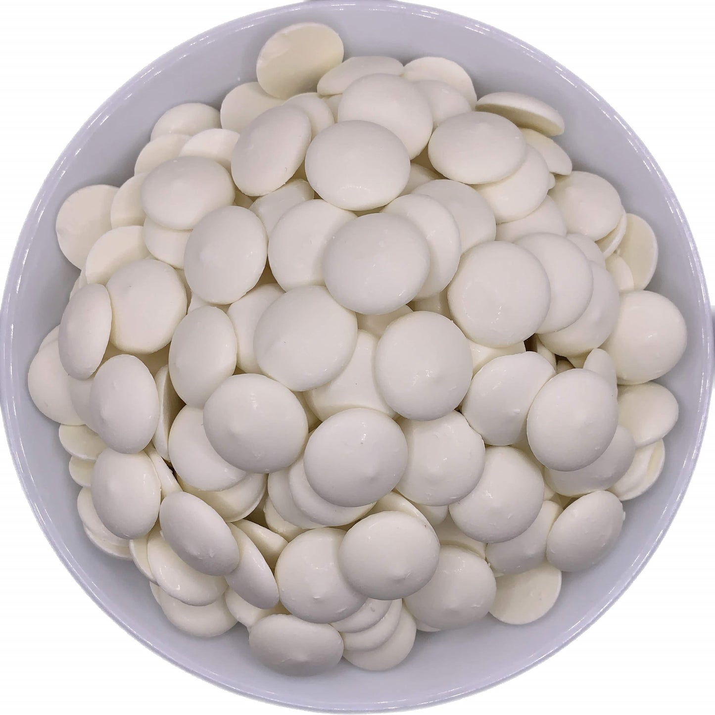 A white bowl brimming with Merckens Super White Chocolate Melting Wafers, offering a bright white hue perfect for custom confectionery designs and chocolate fountains.