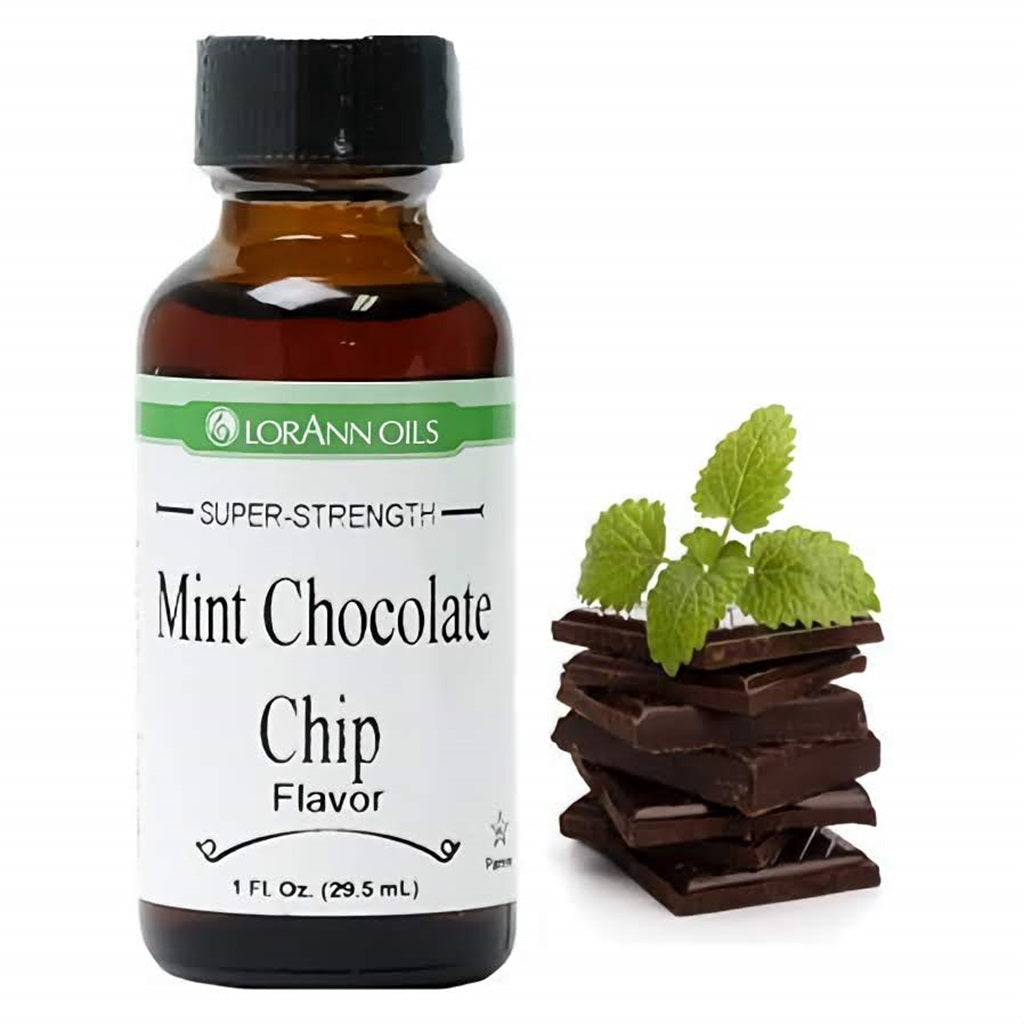 1 fl oz bottle of LorAnn Oils Super Strength Mint Chocolate Chip Flavor, showcased with stacked dark chocolate squares and fresh mint leaves, evoking a classic minty chocolate treat.