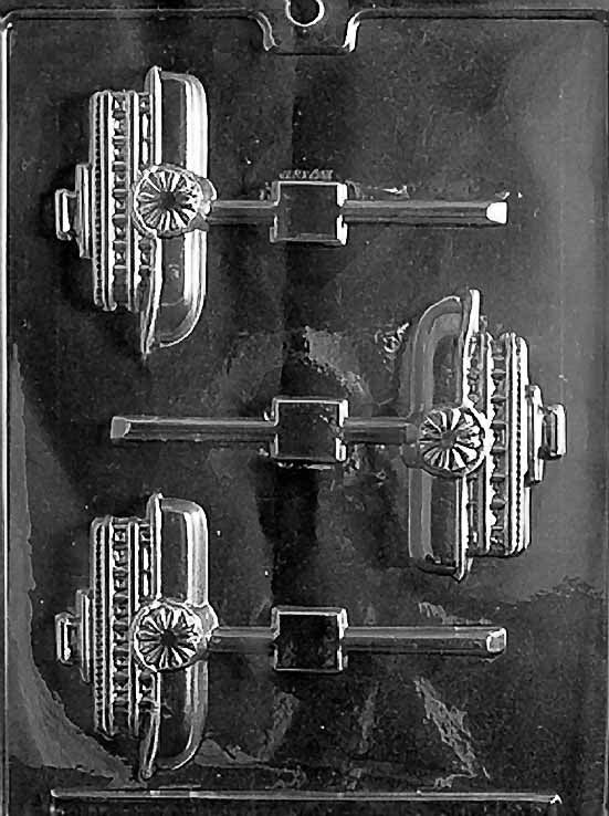 Chocolate mold N029 Steamboat with side profile hull, deck tiers, and paddlewheel details in relief.