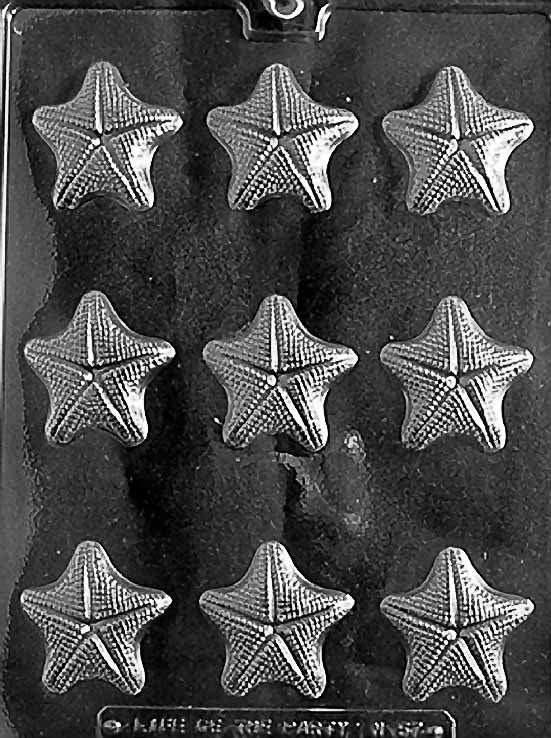 N057 SHELL ASST LIKE N54 NEW STARFI chocolate mold showing multiple miniature shell cavities with fine ridges.