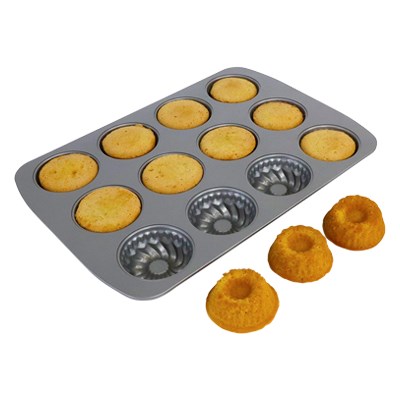 Mini ring cakes baked in the PME 12 Cup Fancy Ring Pan with three golden cakes displayed in front.