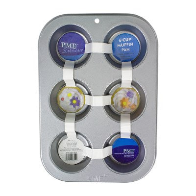 PME Non-Stick 6 Cup Muffin Pan with labelled packaging and decorative cupcakes.