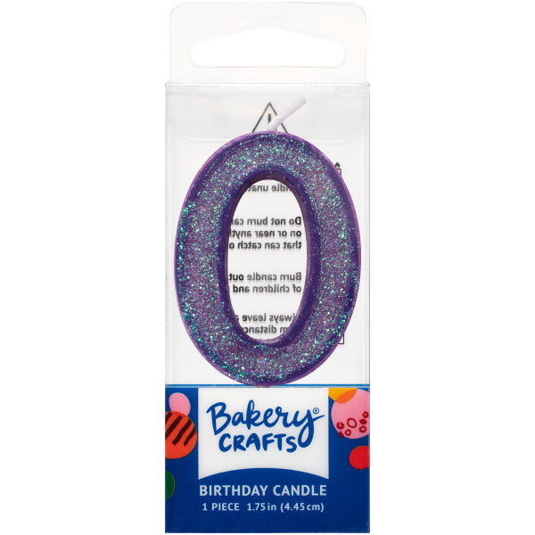 Glittery purple number zero 1.75" birthday candle in packaging from Bakery Crafts.