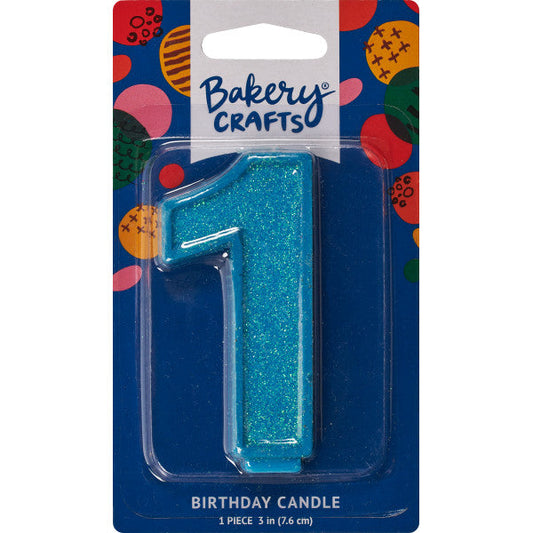 Glittery blue number one 3" birthday candle in packaging from Bakery Crafts.