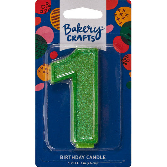 Glittery green number one 3" birthday candle in packaging from Bakery Crafts.