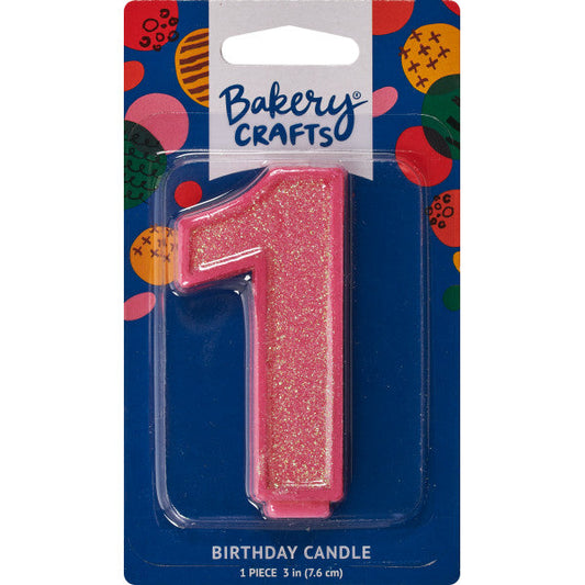 Glittery pink number one 3" birthday candle in packaging from Bakery Crafts.
