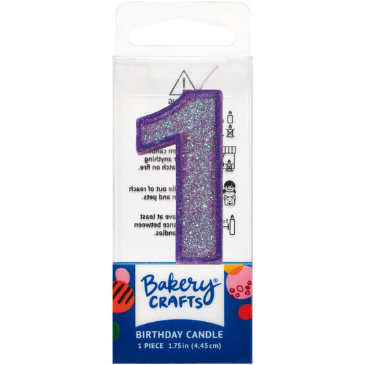 Glittery purple number one 1.75" birthday candle in packaging from Bakery Crafts.